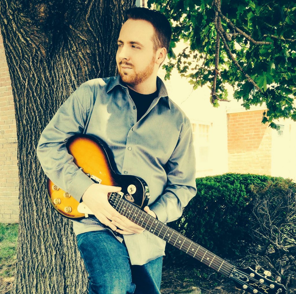 D. S. Bradford - With Guitar (Square)